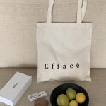 "efface" tote bag