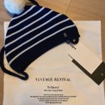 The Barnnet Pompom String Striped Knit Beanie